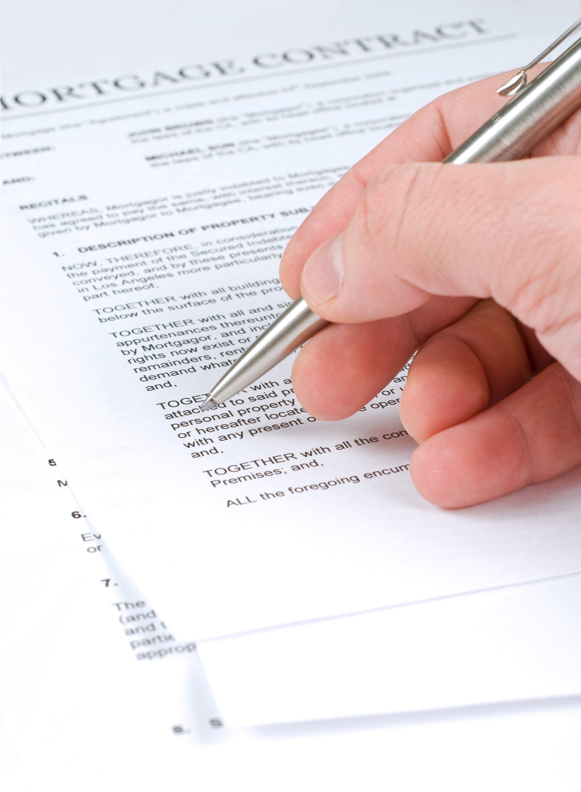 Man examining mortgage contract